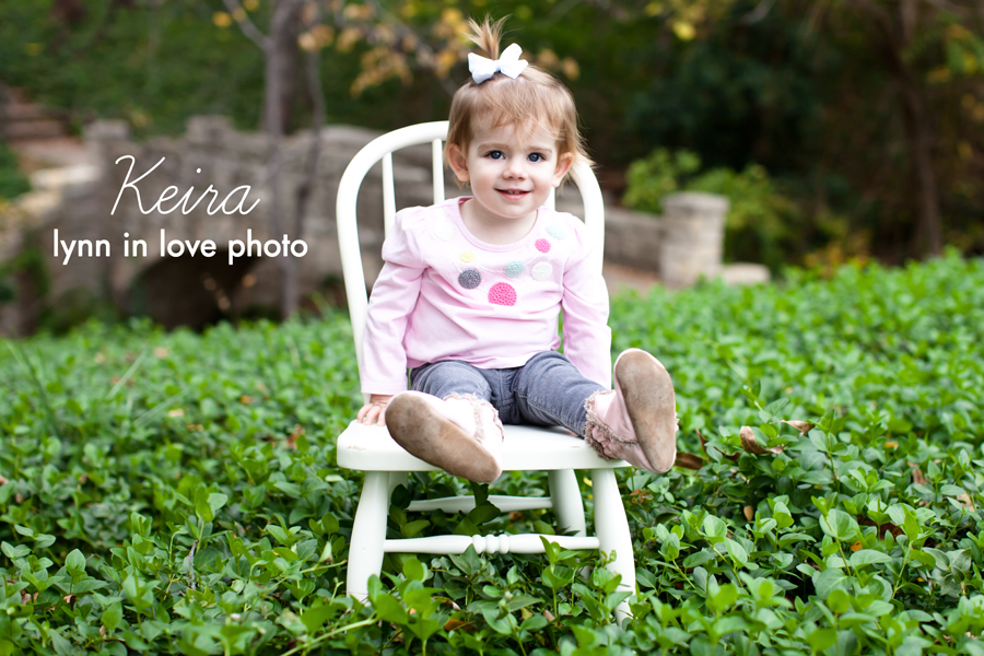 Keira's 18 month Baby Session in Highland Park, Dallas, TX sitting on white Pottery Barn chair by Lynn in Love Photo, Dallas Baby Photographer