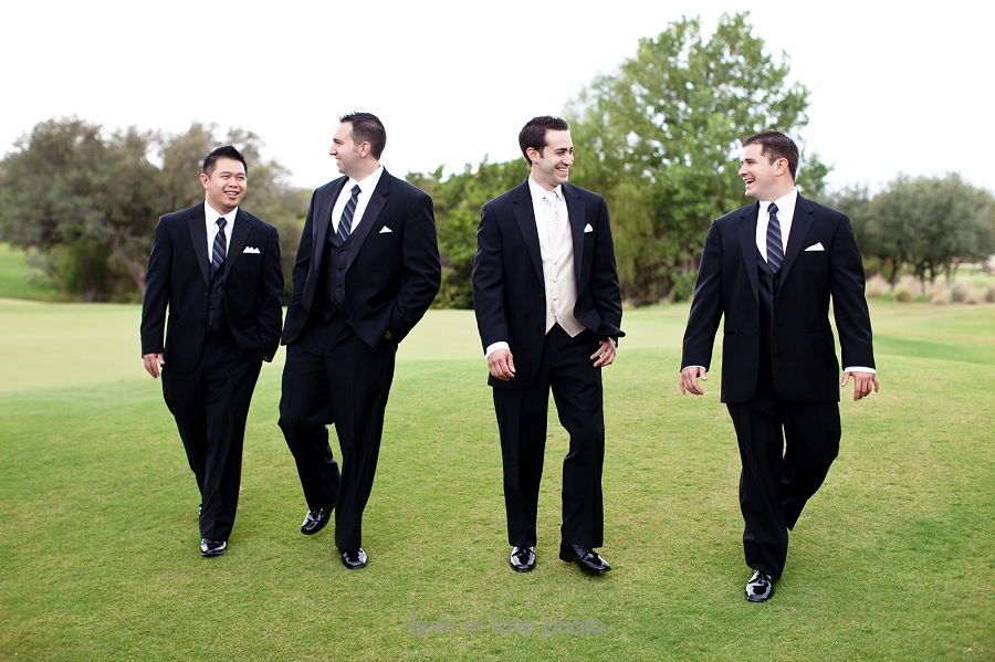 groomsmen walking on golf course