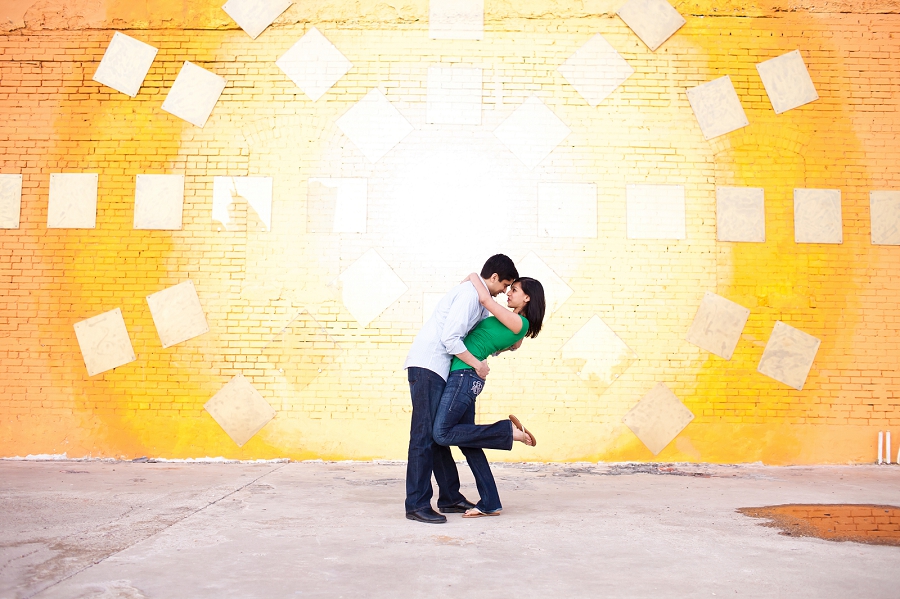 Lynn in Love Photo, Dallas Wedding Photographer with bright colored sunburst wall