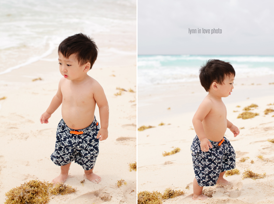 Baby Asian boy in blue swim trunks on the beach in white outfits in Cancun, Mexico, by Lynn in Love Photo, Dallas Family Photographer