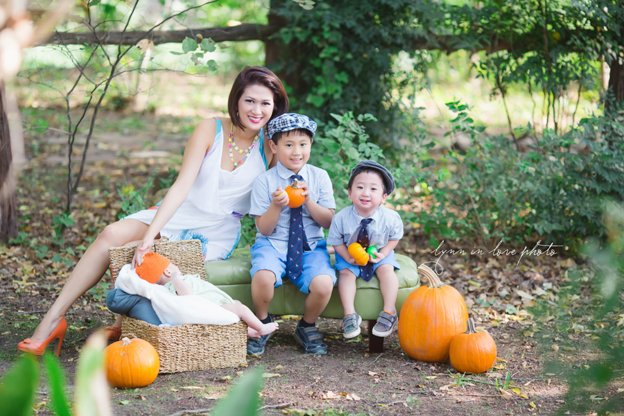 Beautiful and bright asian fall family portrats with pumpkins by Lynn in Love Photo, Dallas and Houston Family Photographer